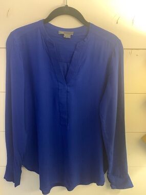 Vince royal blue v neck blouse. Size 2.  17” pit to pit. Approx 23” length.